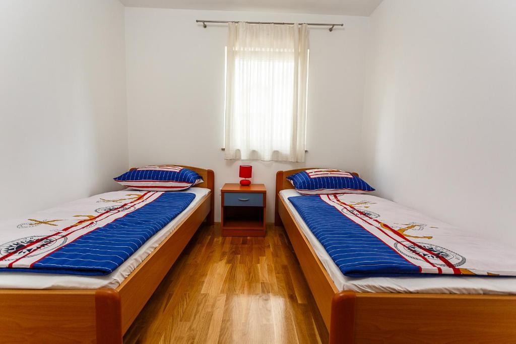 Apartments Mare & Mons Deluxe Malinska Quarto foto